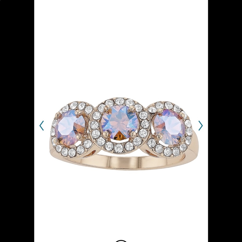 New. Brilliance triple halo ring. Size 7